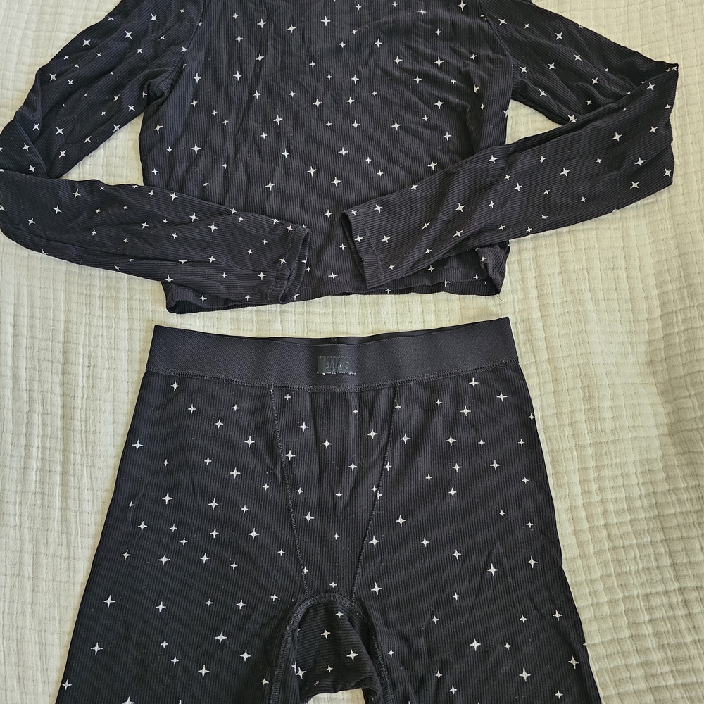 SKIMS Black Ribbed Long Sleeve Top & Shorts Set with White Star Print